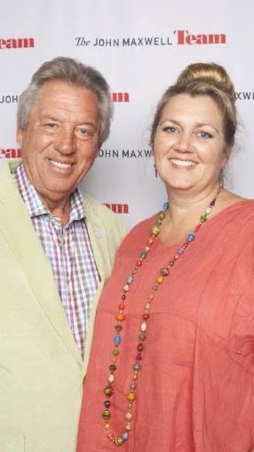 Melanie with John Maxwell at a John Maxwell Team event
